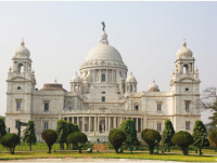 The Victoria Memorial in Kolkata -, highlighting the city's historical and architectural importance.